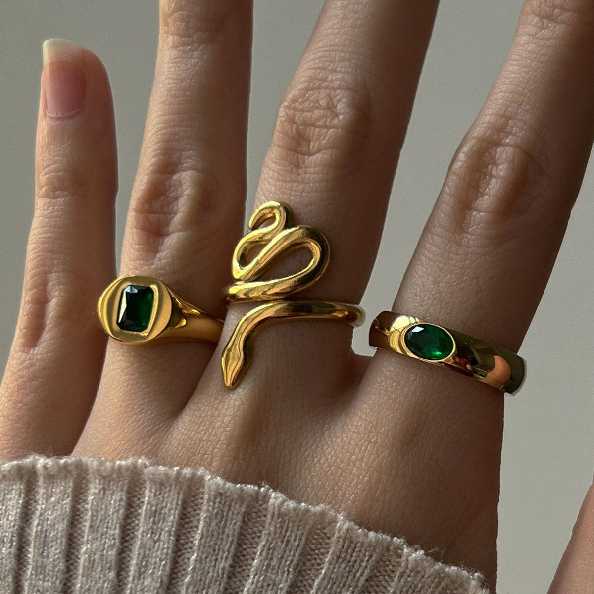 Gold ring with emerald gem