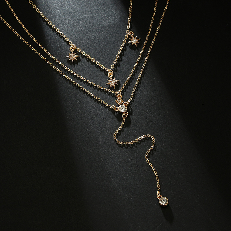 Layered necklace with boho crystal star charms