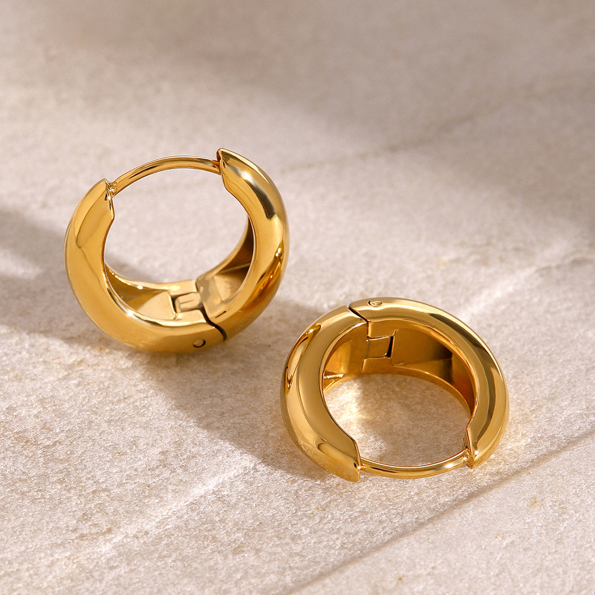 Iris – Gold Geometric Huggie Earrings