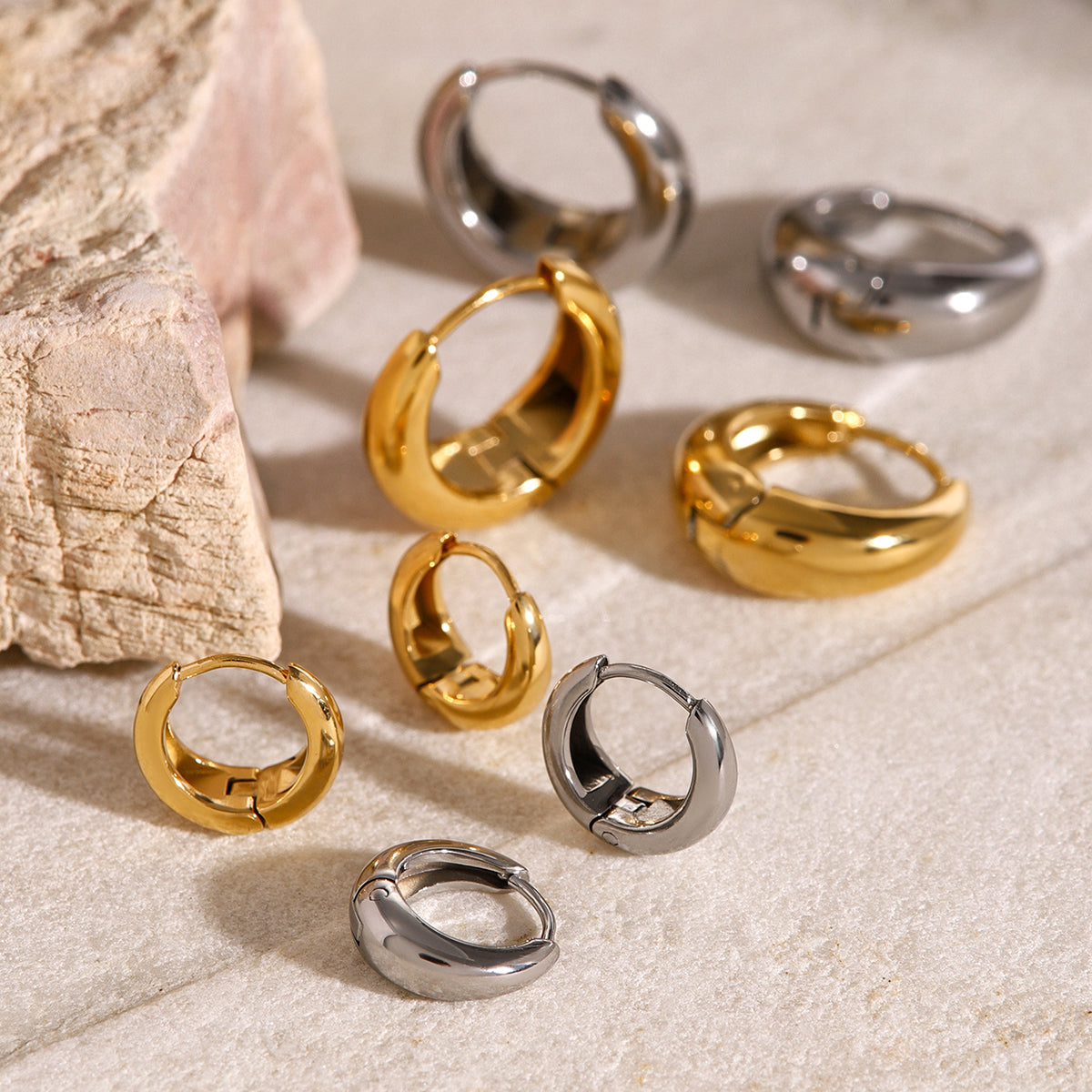 Iris – Gold Geometric Huggie Earrings