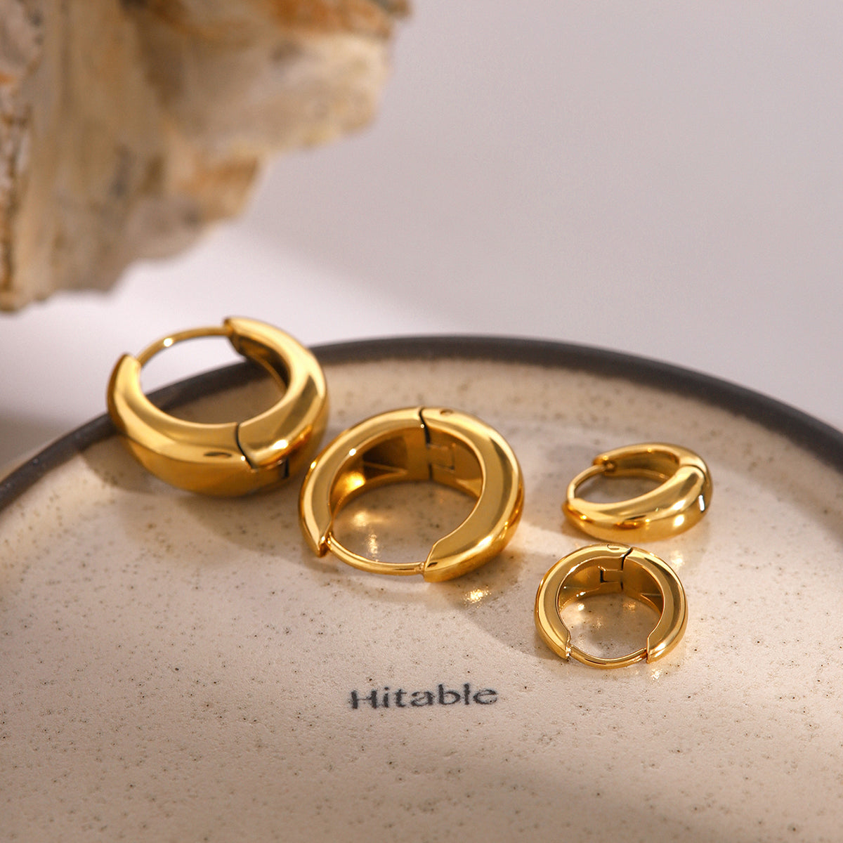 Iris – Gold Geometric Huggie Earrings