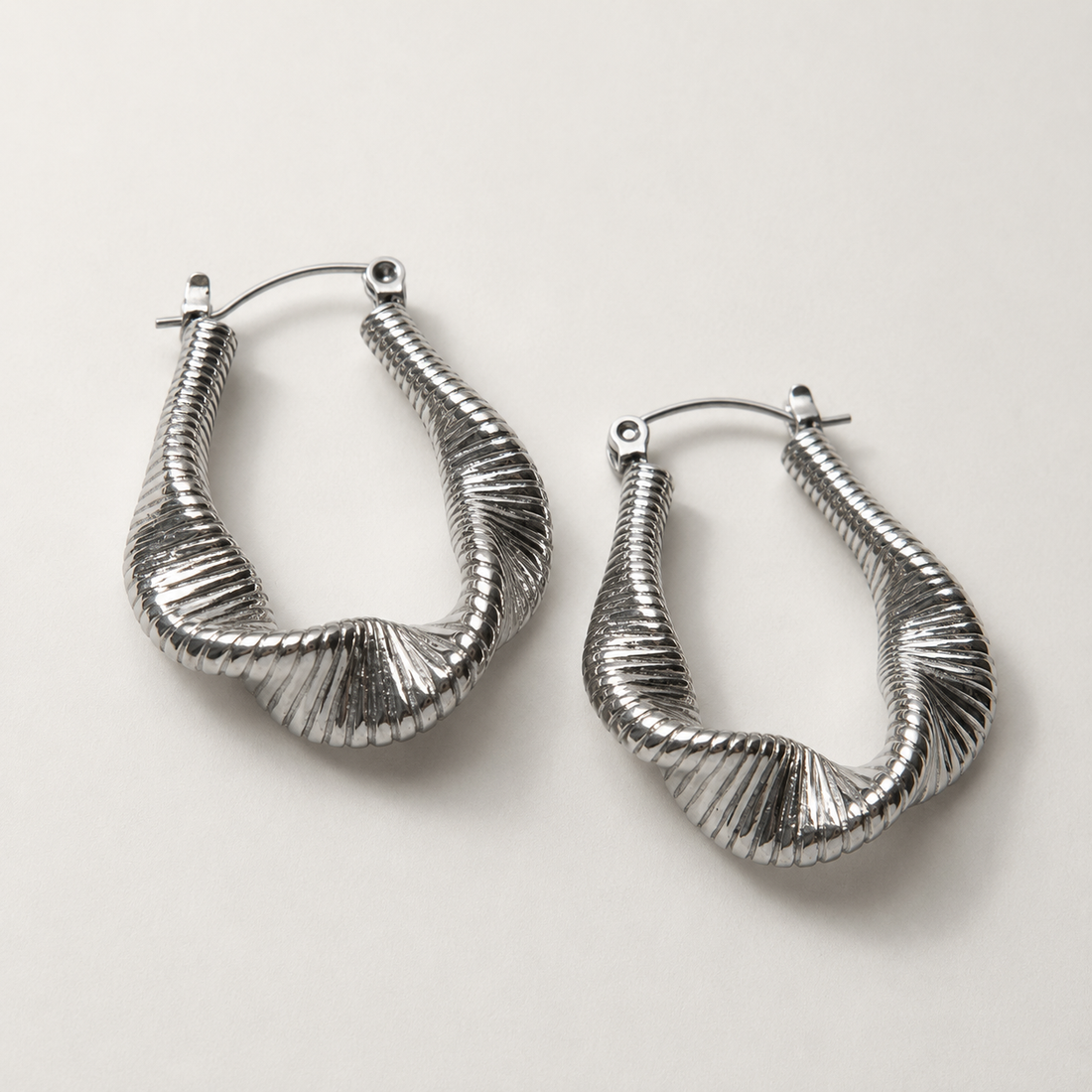 Lyra - Silver hoops with fluid waves