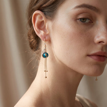 Sheynn – Holiday earrings with blue pearls
