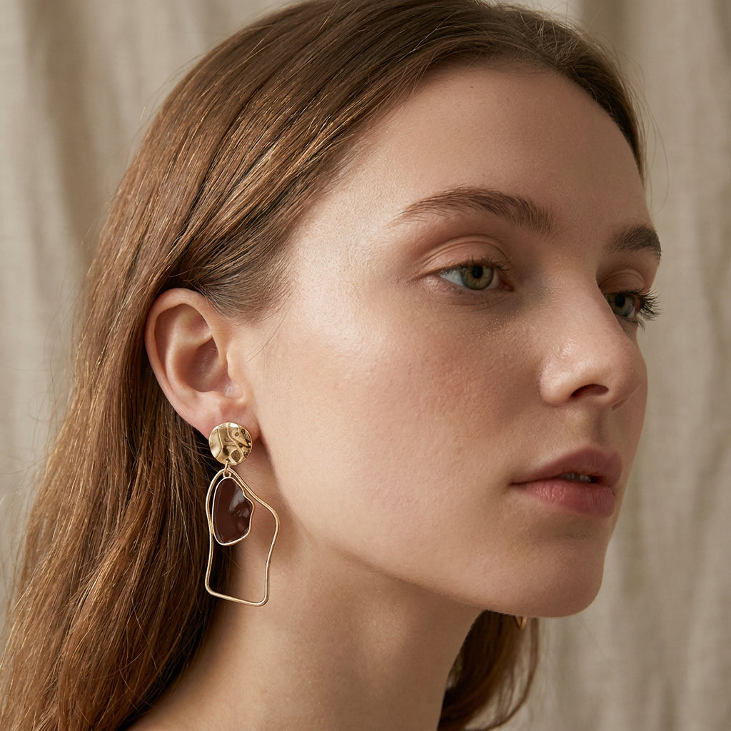 Rhia – Earrings with irregular dangling pendants