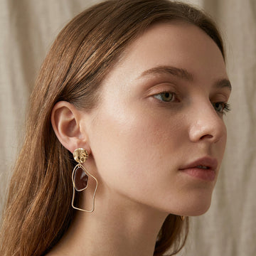 Rhia – Earrings with irregular dangling pendants