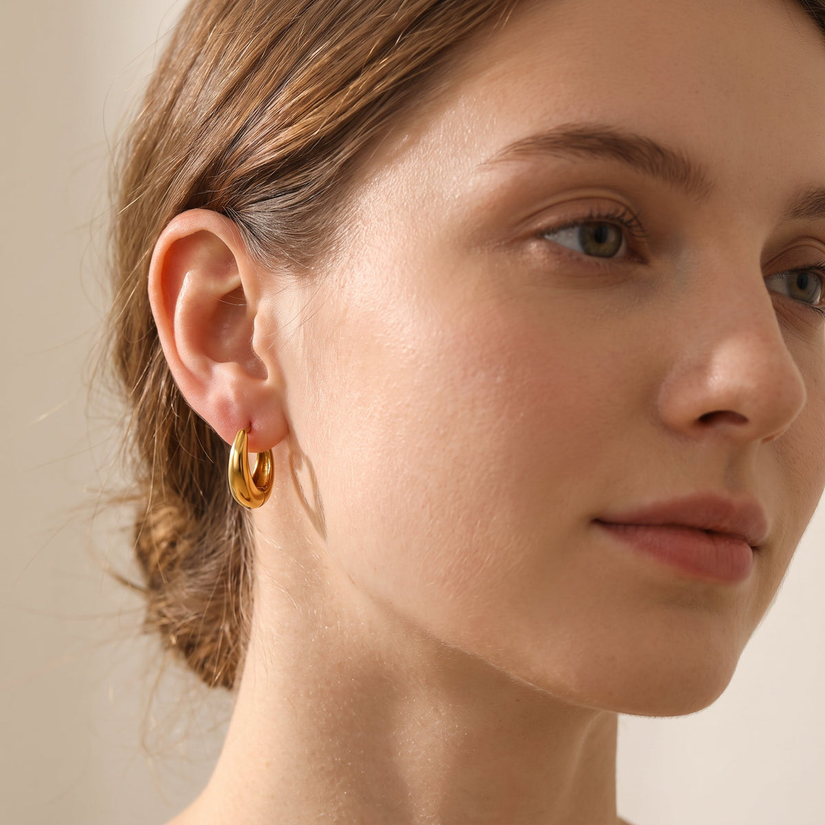 Iris – Gold Geometric Huggie Earrings