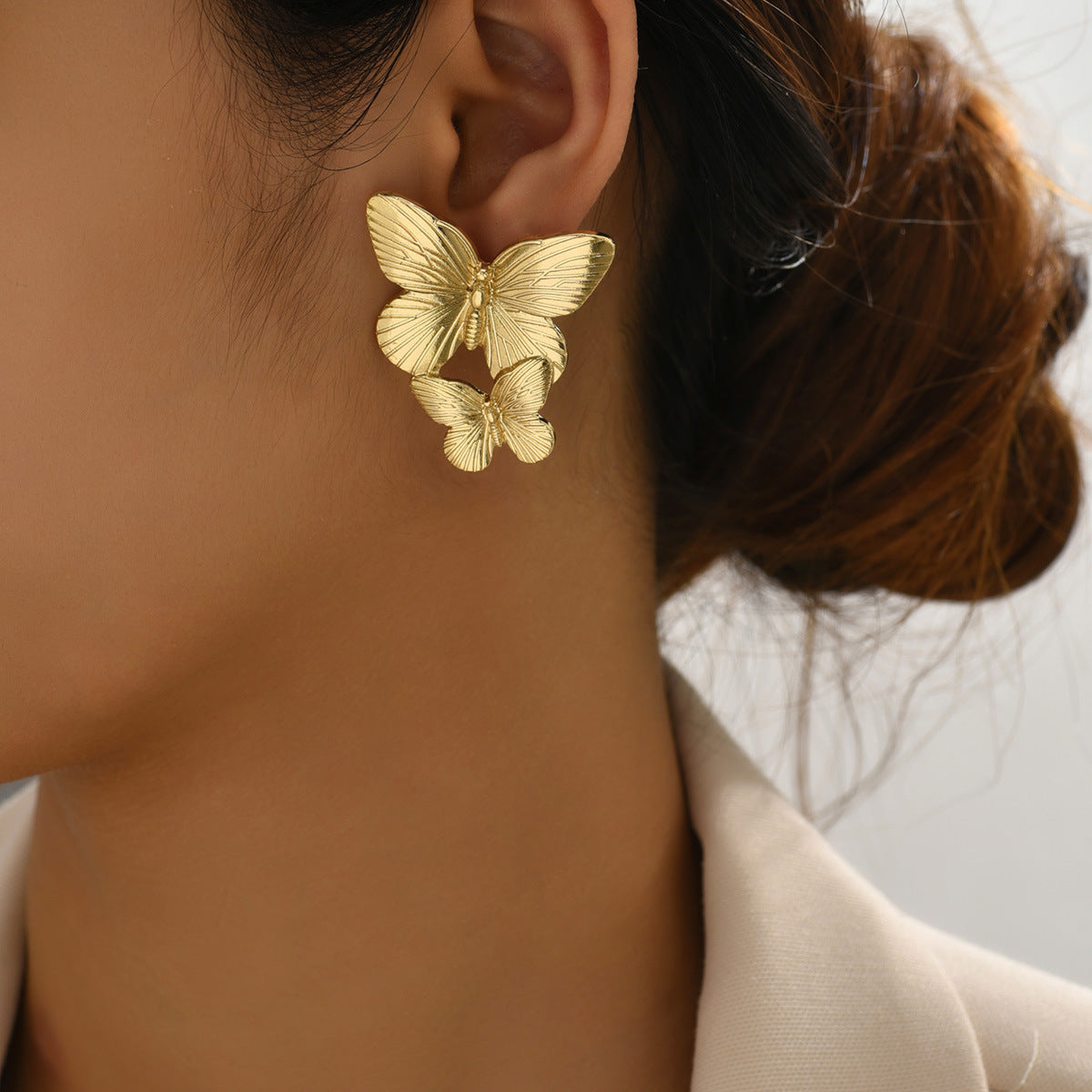 Mariah - Gold earrings in the shape of a butterfly