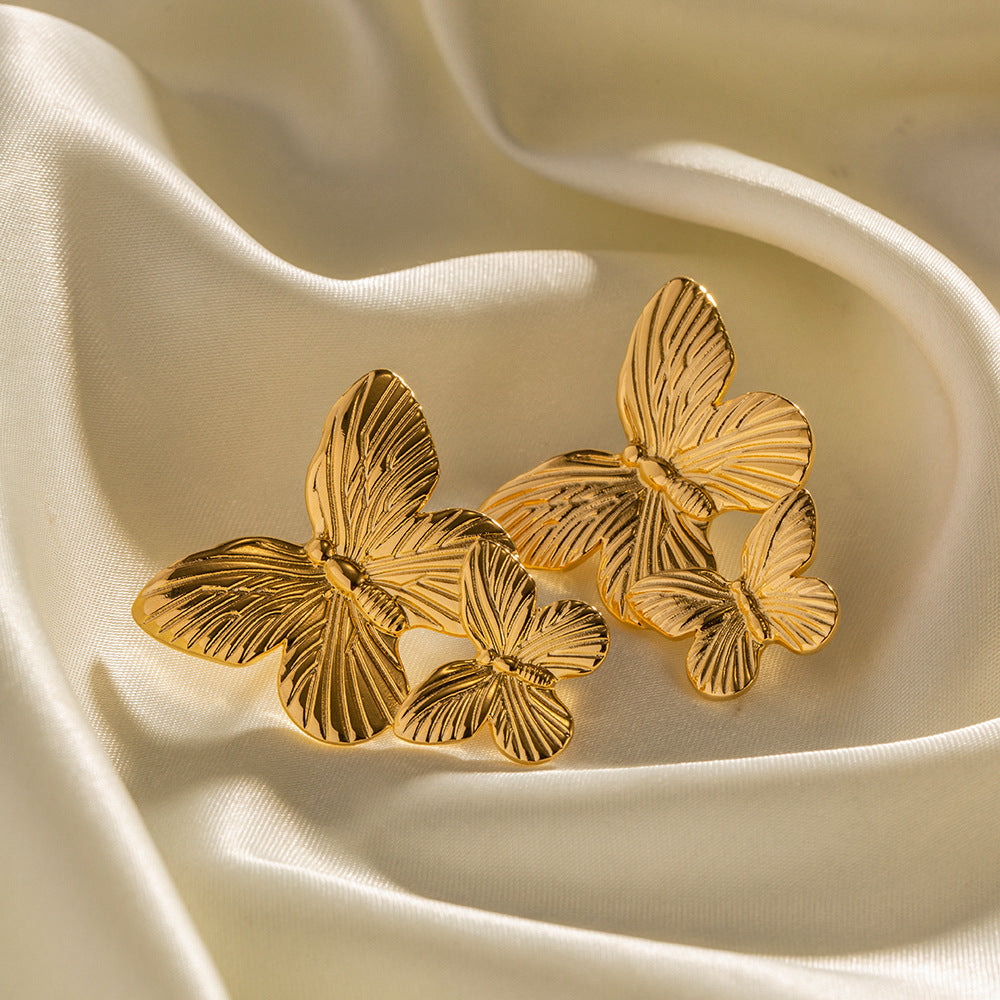 Mariah - Gold earrings in the shape of a butterfly