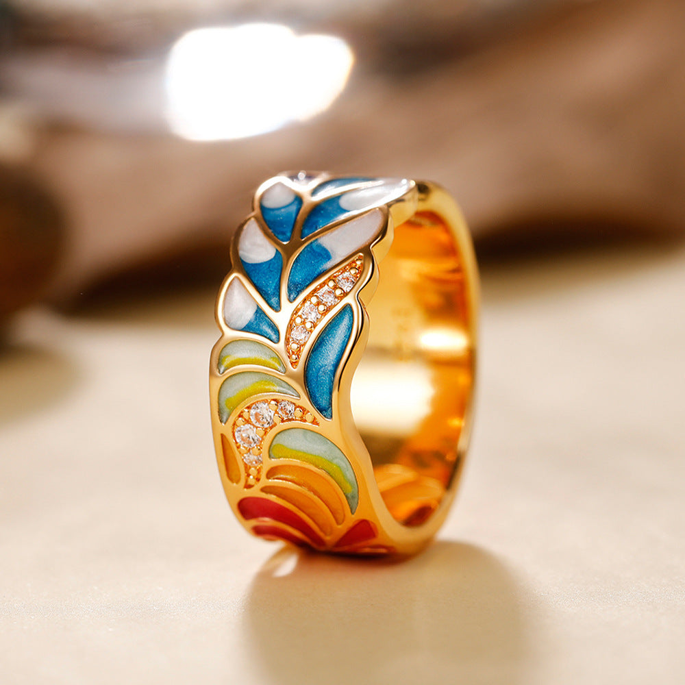 Margaux – ring of golden motif ceramic blue and white