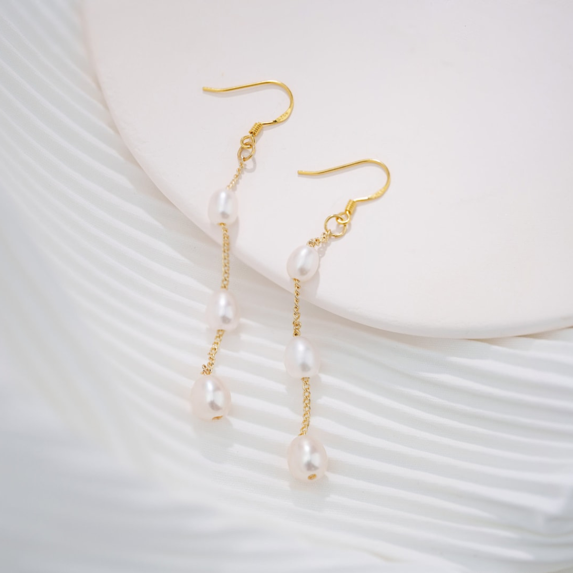 Various pearl drops - dangling earrings