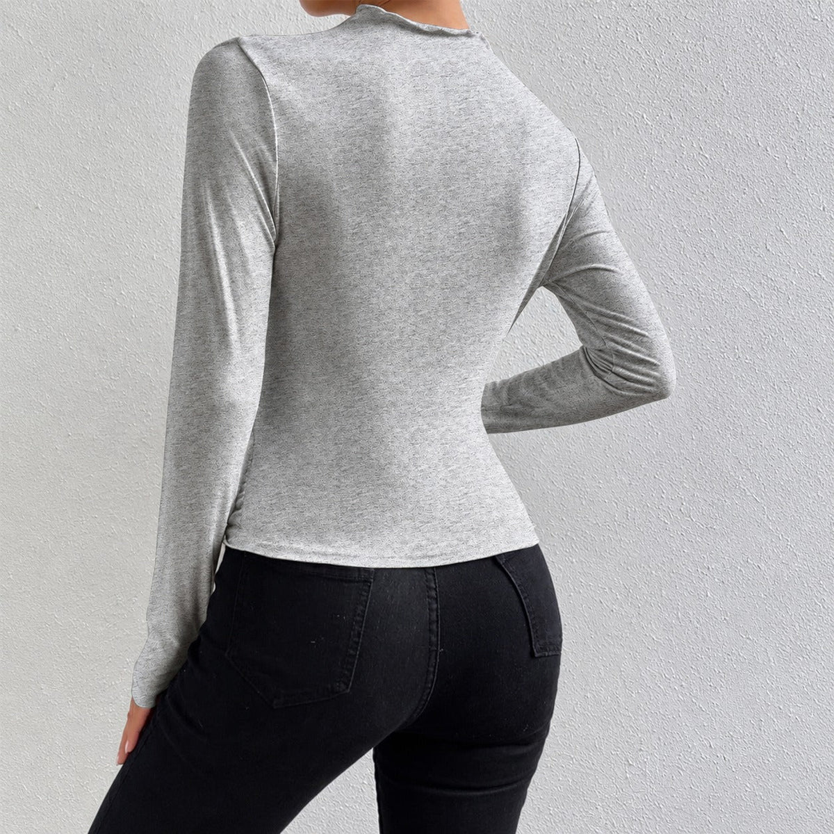 Livia - Long-sleeved, form-fitting shirt with ruffles