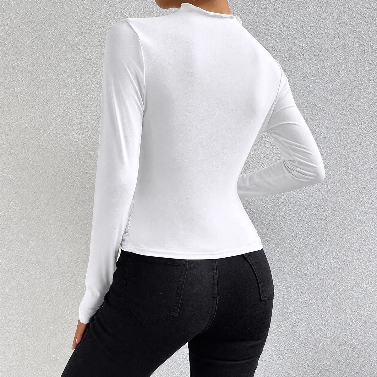 Livia - Long-sleeved, form-fitting shirt with ruffles