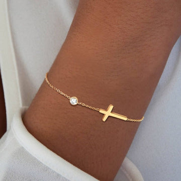 Althea – Bracelet with cross for ladies in gold and silver