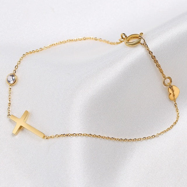 Althea – Bracelet with cross for ladies in gold and silver