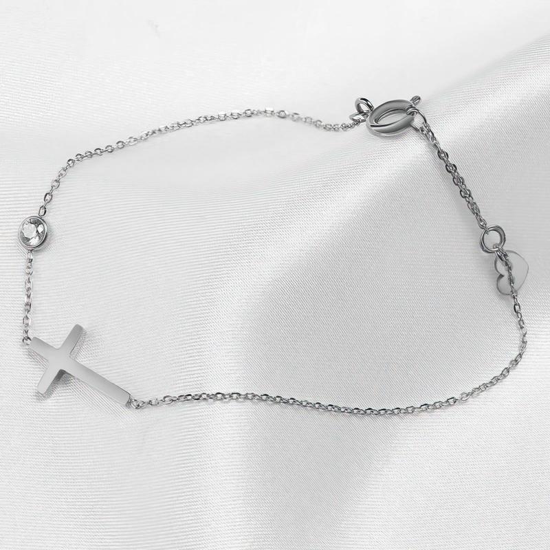 Althea – Bracelet with cross for ladies in gold and silver