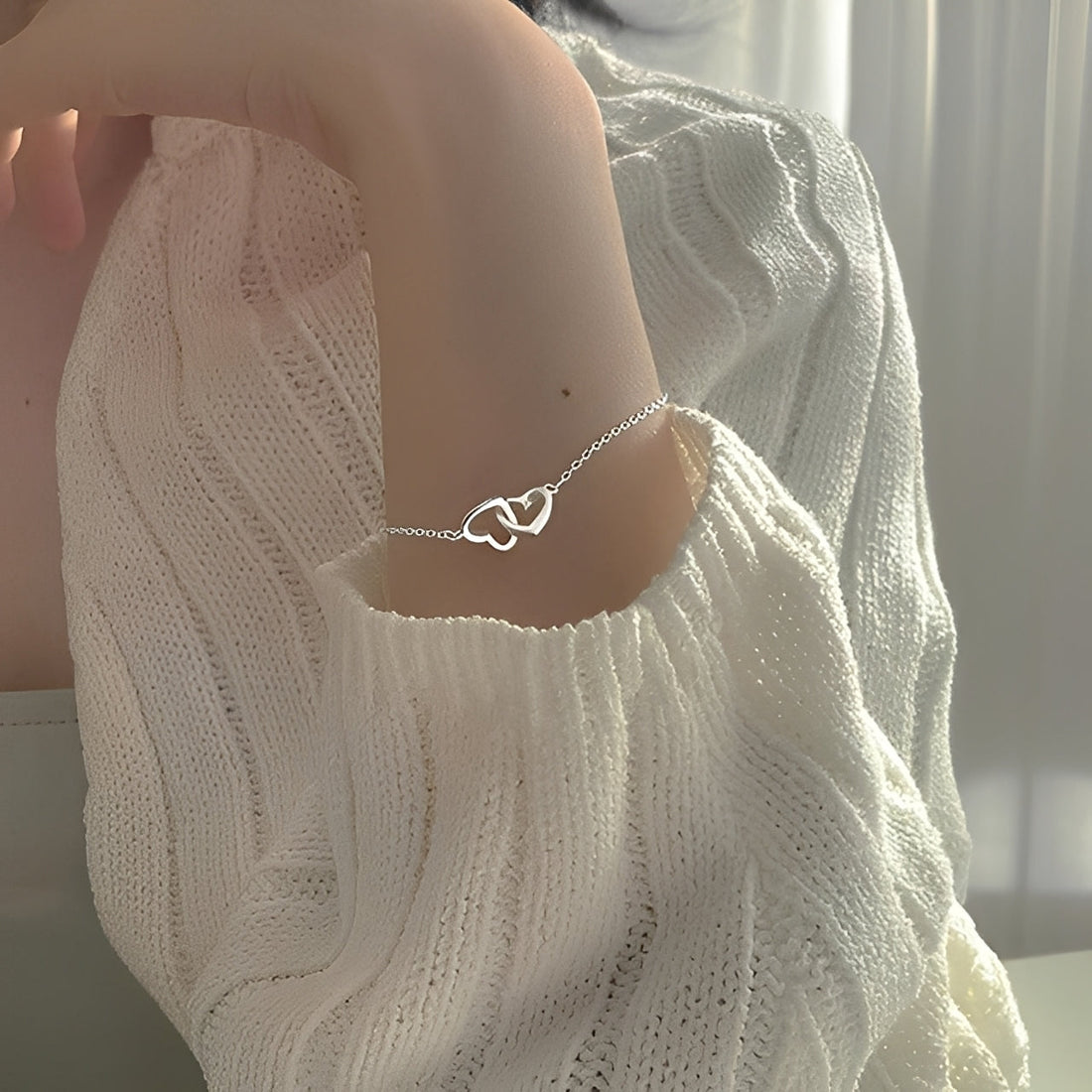 Amara – Bracelet charm with double heart