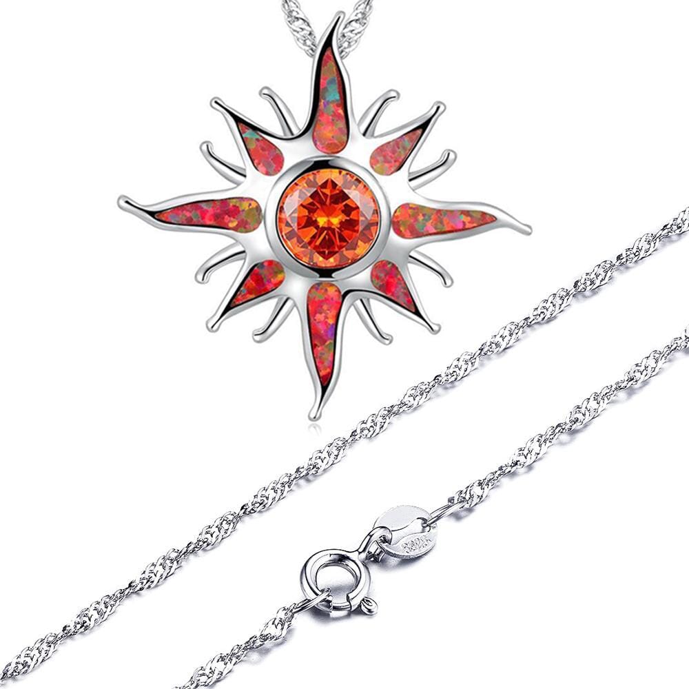 Yani – Necklace with sun ray pendant of fire opal and garnet