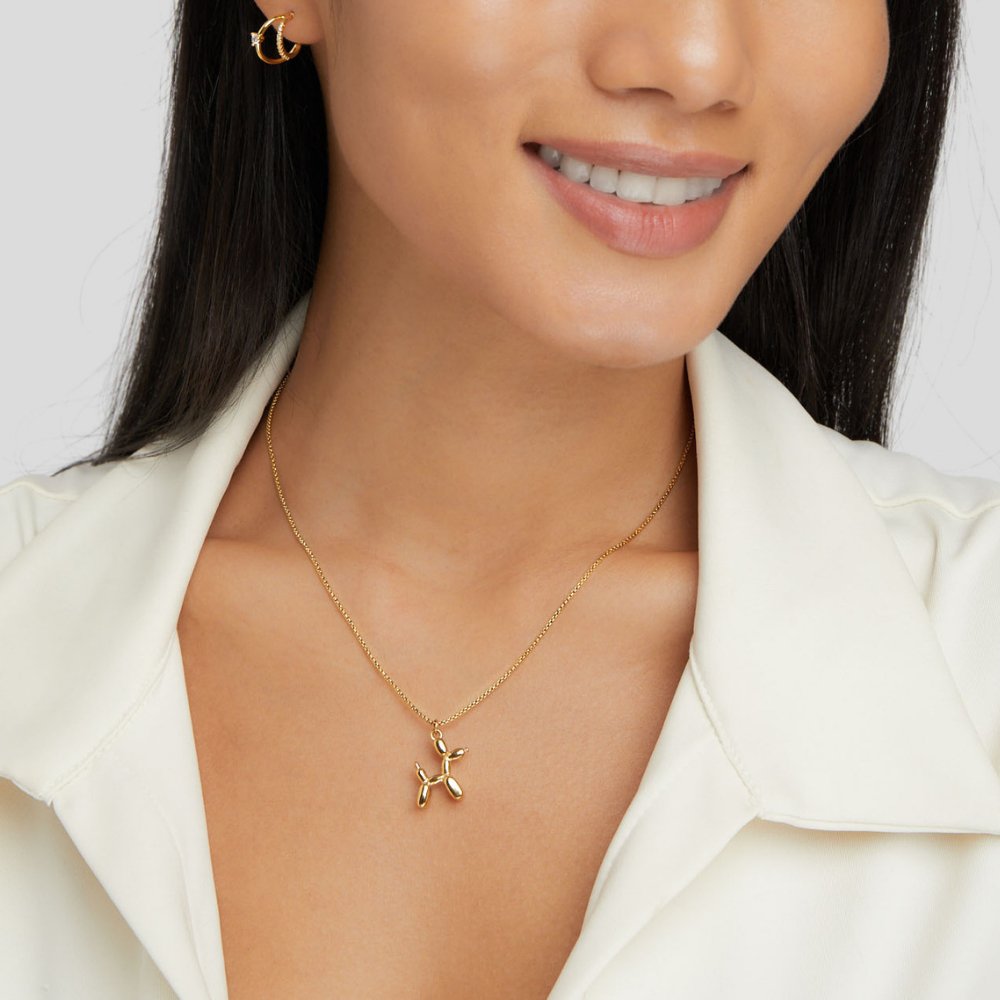 Nerina – Collar with dog and golden balloon pendant