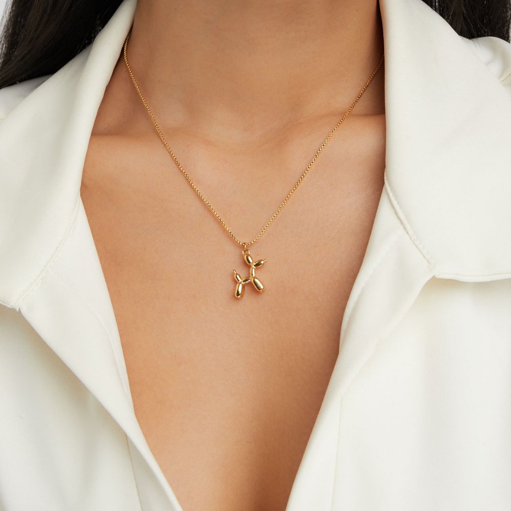 Nerina – Collar with dog and golden balloon pendant