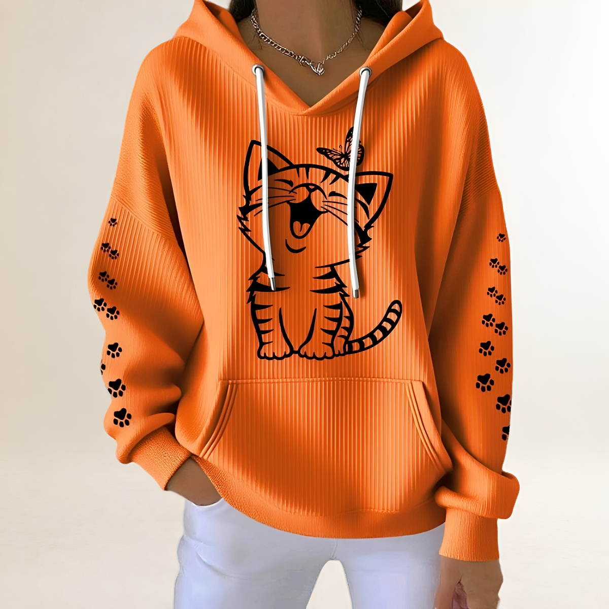 Women's hoodie with cat graphic and paw-print sleeves, drawstring hood, kangaroo pocket, relaxed fit