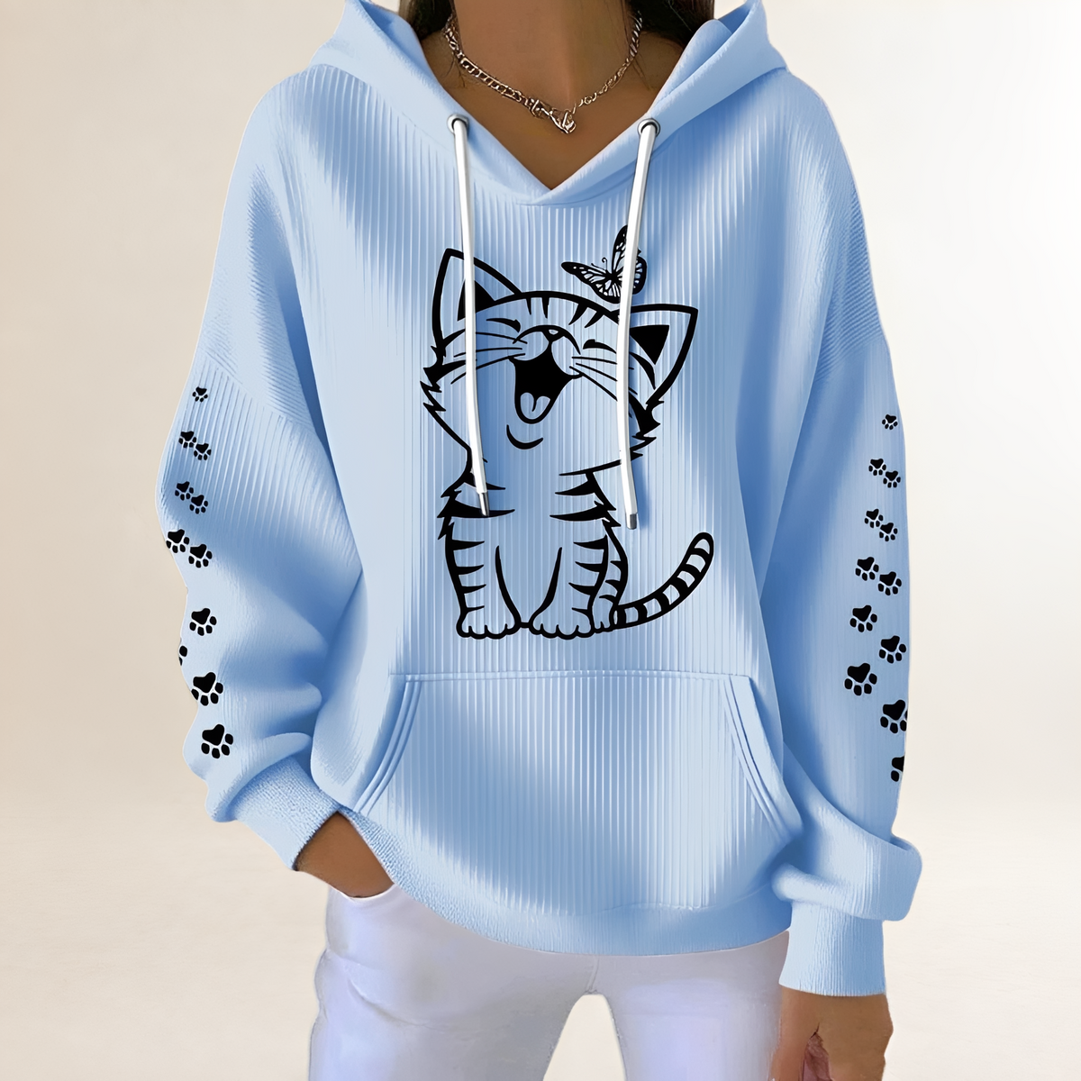 Women's hoodie with cat graphic and paw-print sleeves, drawstring hood, kangaroo pocket, relaxed fit