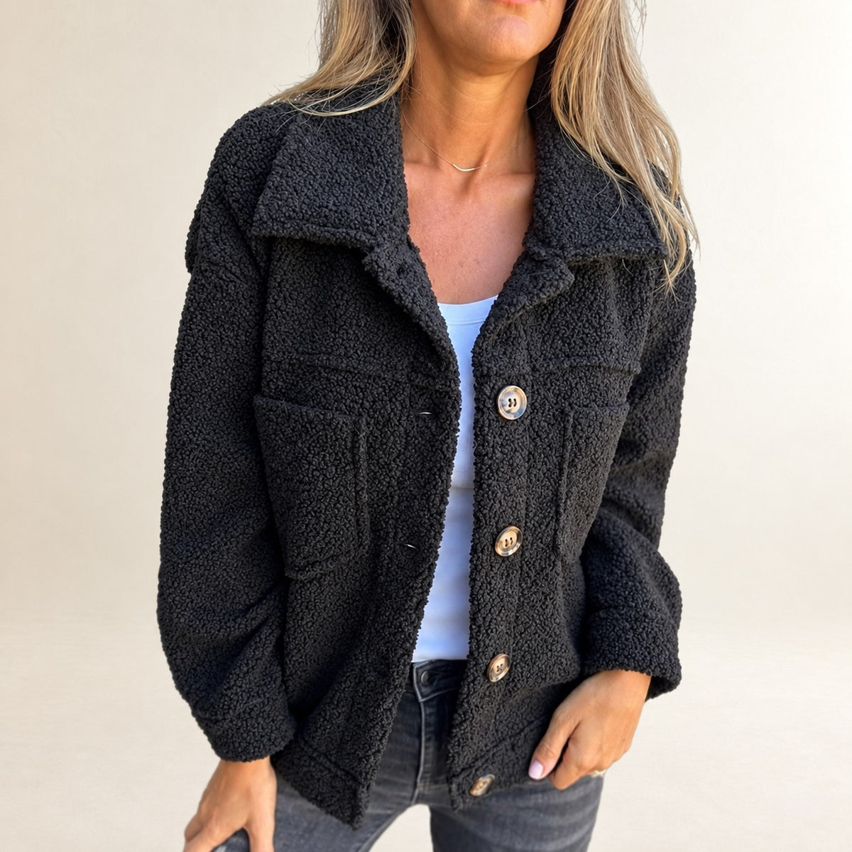 Women's short button-front textured jacket with lapel collar and patch pockets, relaxed fit