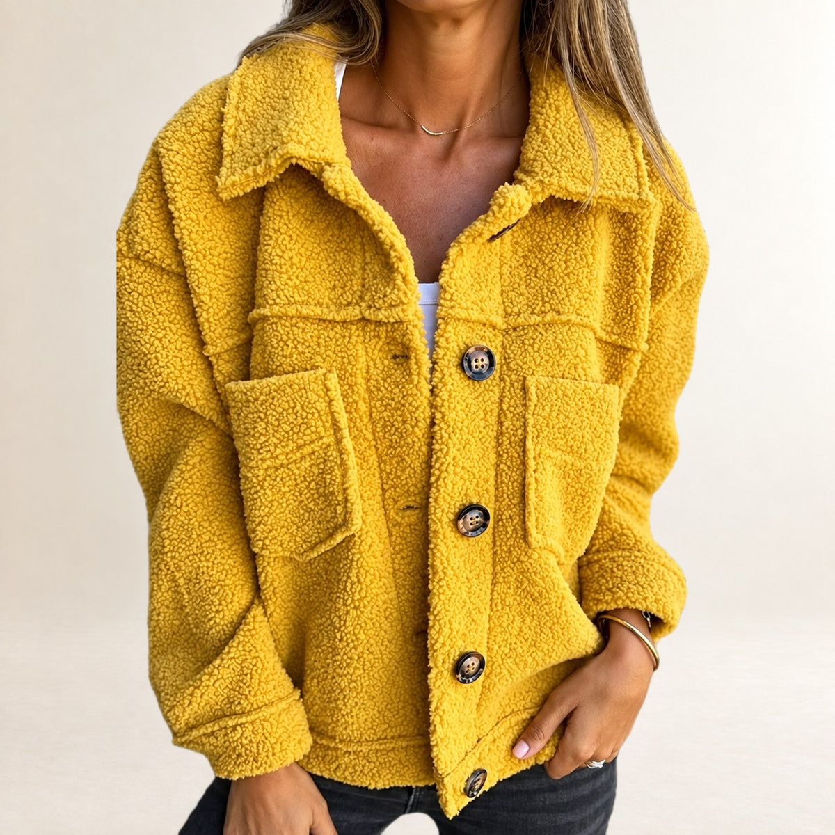 Women's short button-front textured jacket with lapel collar and patch pockets, relaxed fit