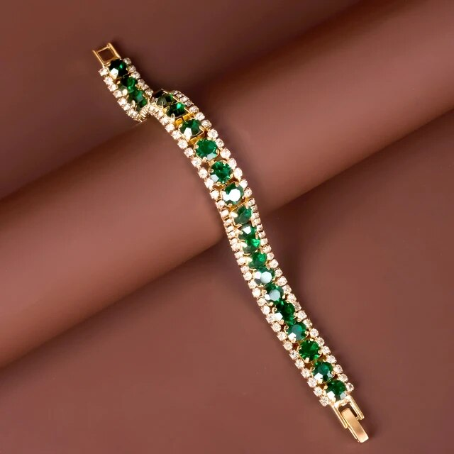 Maud – Elegant golden bracelet with green accents