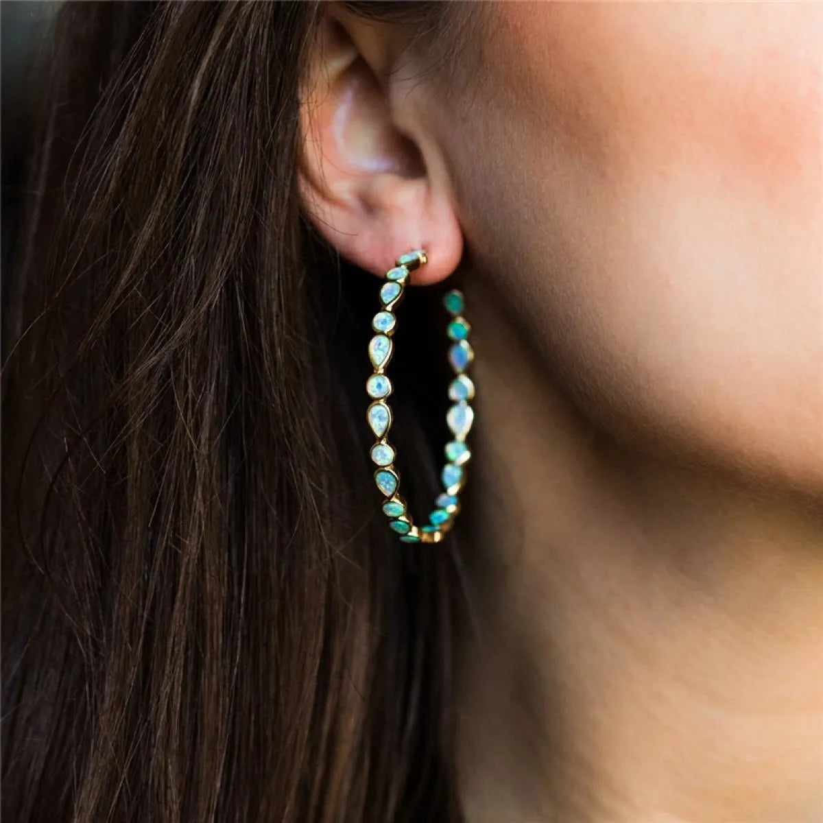 Raya – Vintage gold hoops with blue opal