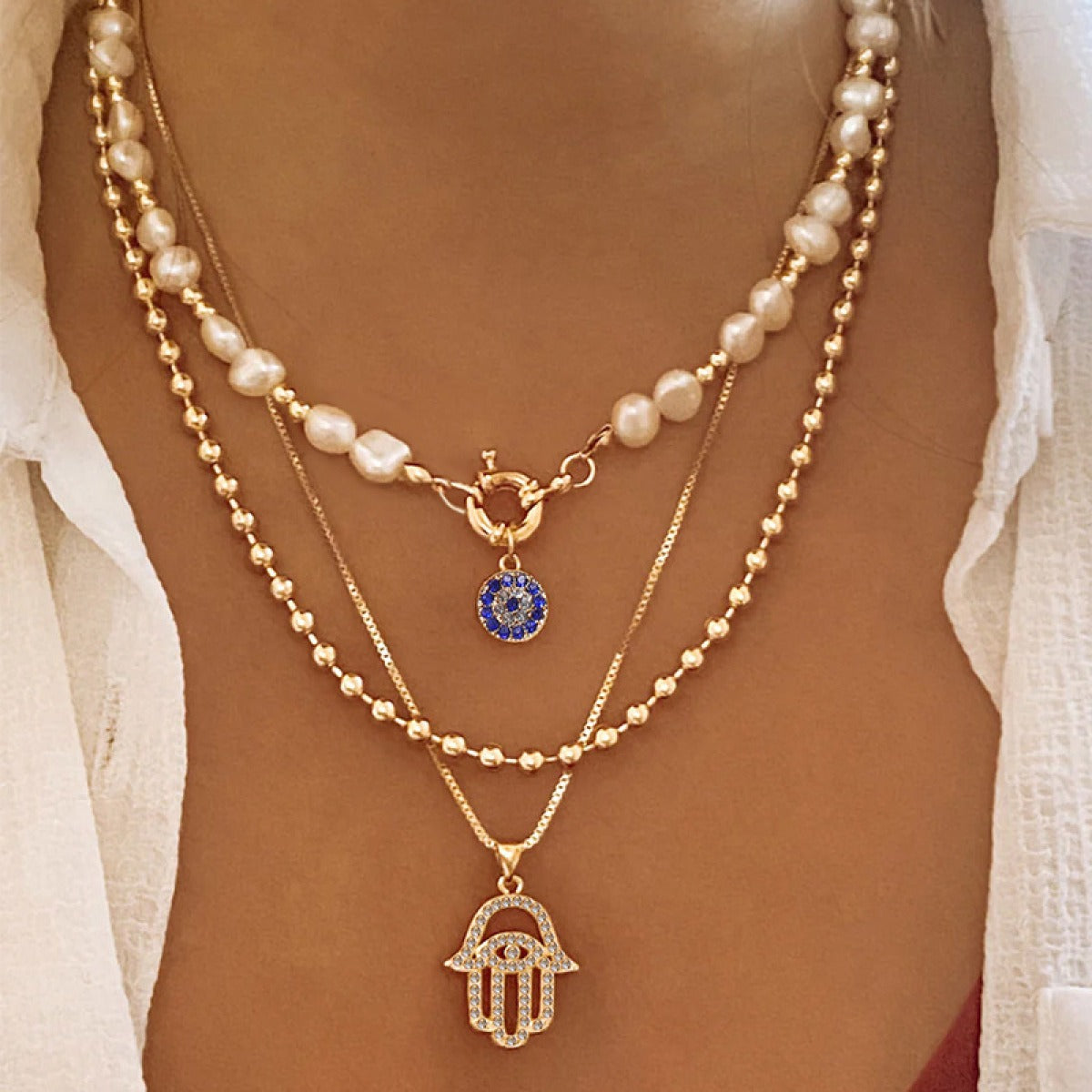 Jade – Multi-level Pearl Necklace and Hamsa