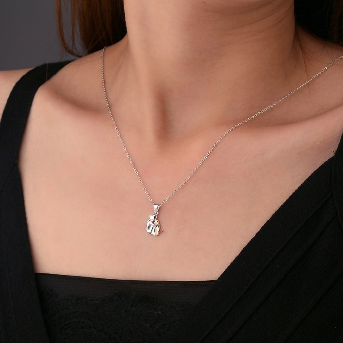 Light – Necklace with hug pendant