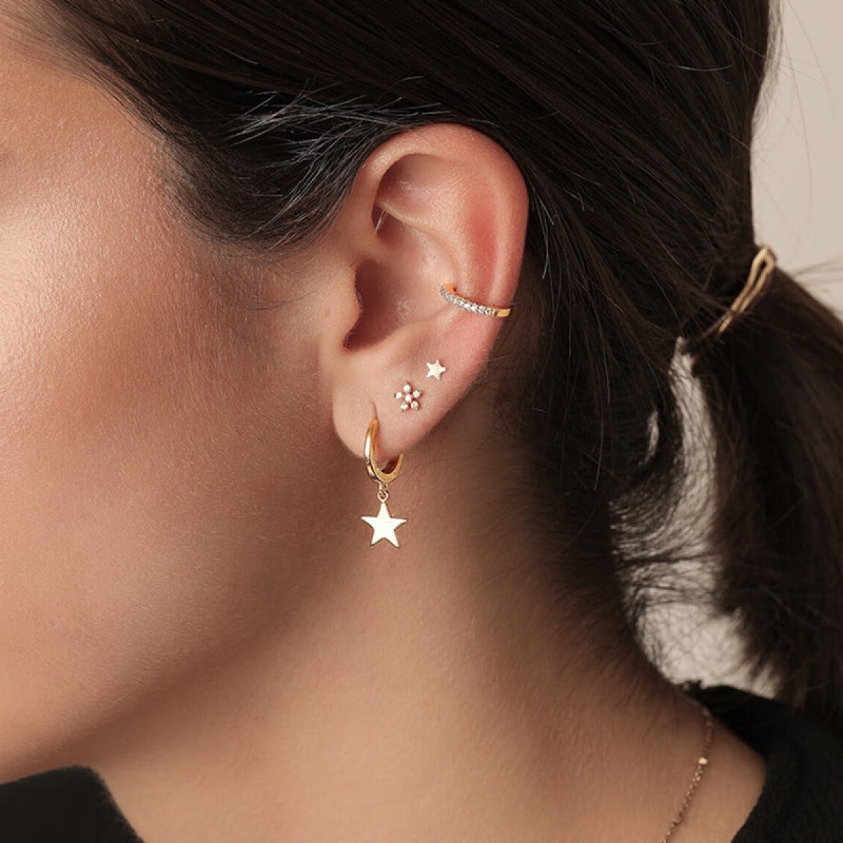 Stellia – Star earrings with five points in gold