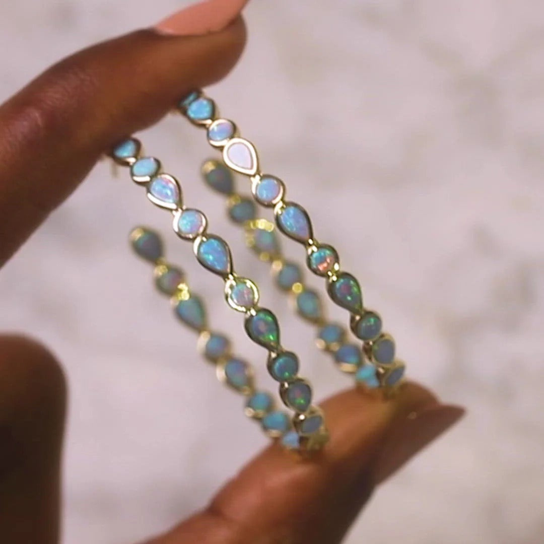 Raya – Vintage gold hoops with blue opal