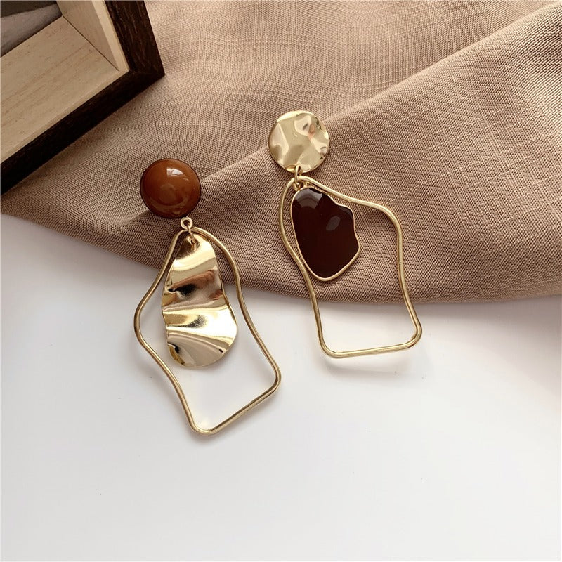 Rhia – Earrings with irregular dangling pendants
