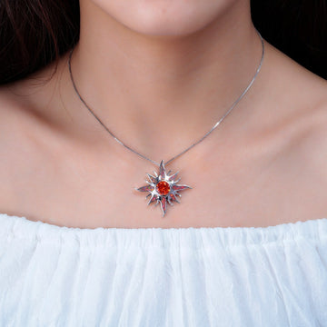 Yani – Necklace with sun ray pendant of fire opal and garnet