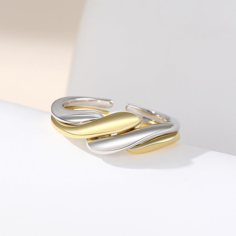 Elaine – Silver ring with irregular wave design