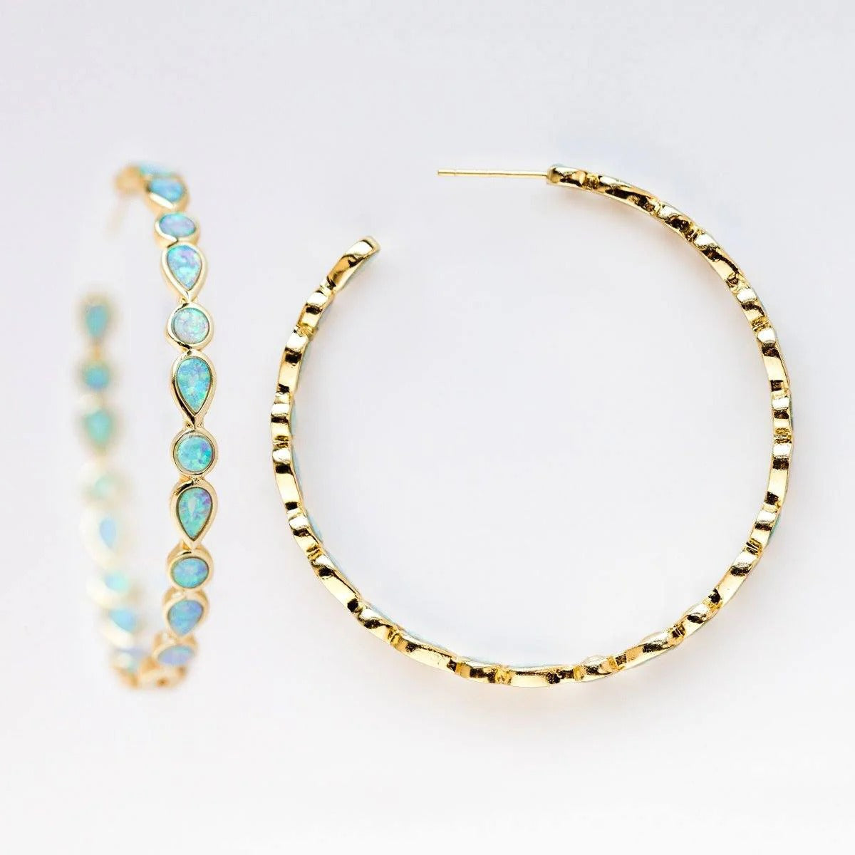 Raya – Vintage gold hoops with blue opal